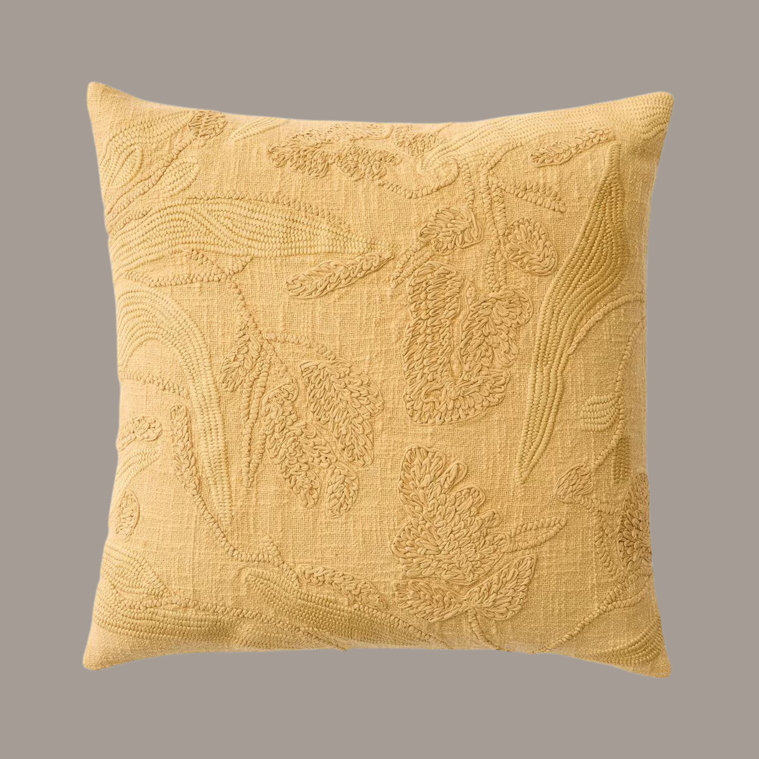 An embroidered yellow cushion