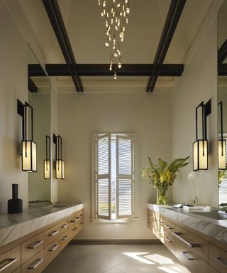 bathroom with wooden vanity units