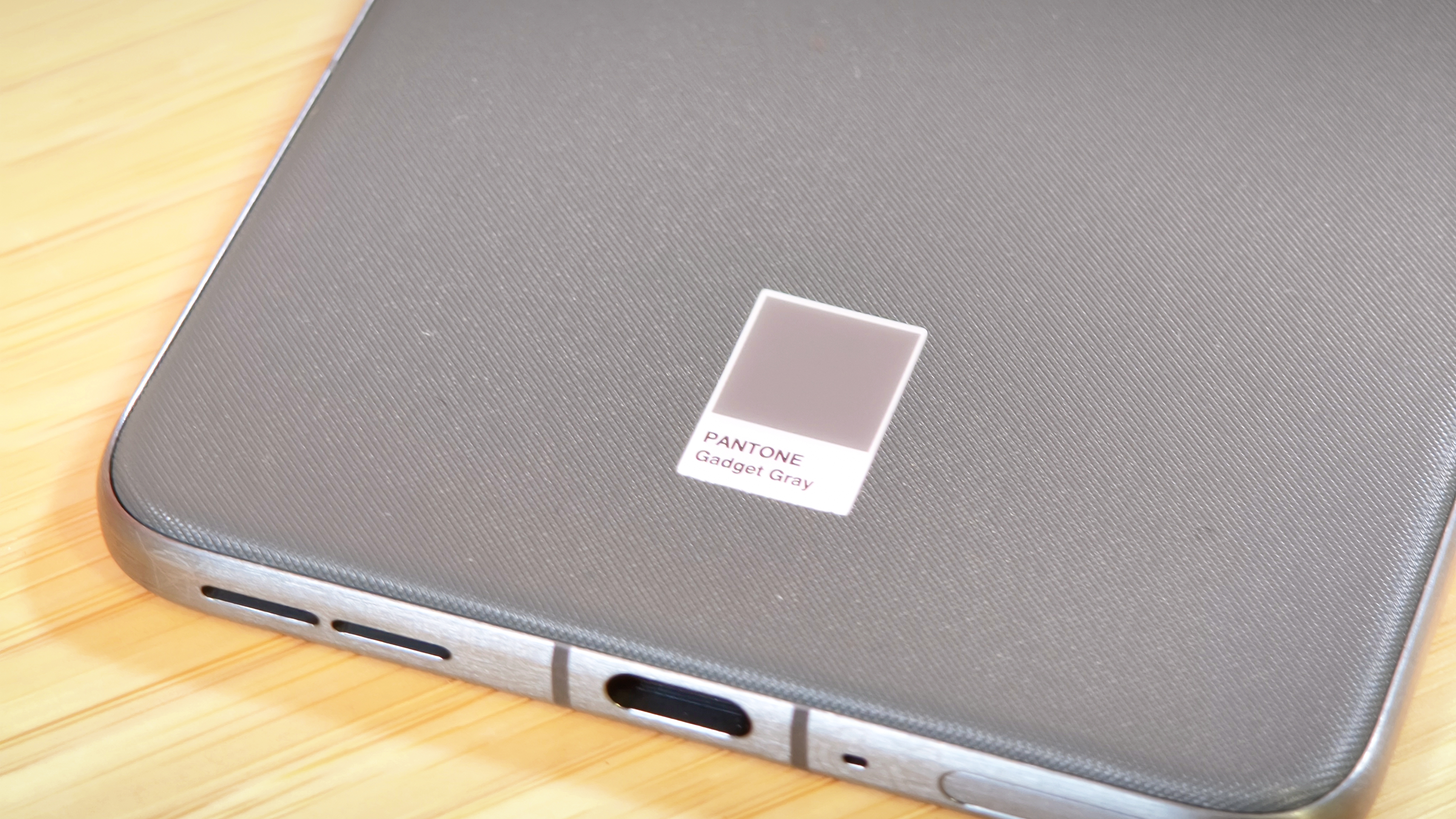 Motorola Edge 70 phone on a wooden desk