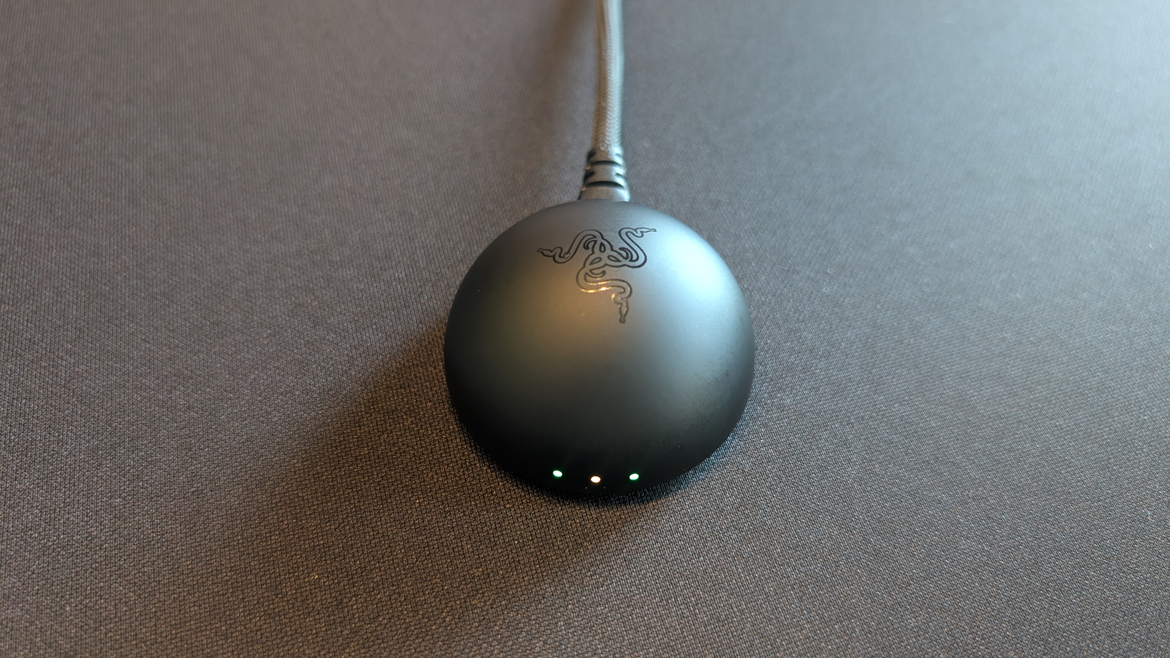 The Razer Viper V4 Pro gaming mouse pictured on the Razer Gigantus V2 Pro mouse mat.