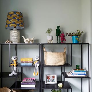 room with table lamp and book