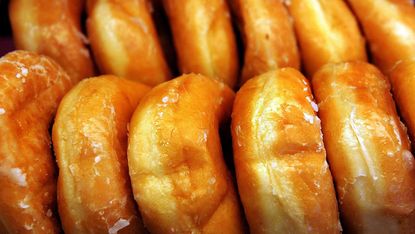 Suspect delivered himself and a box of donuts to police after Facebook dare