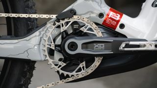 Close up of the SRAM chain ring and cranks on the Canyon Strive:ON
