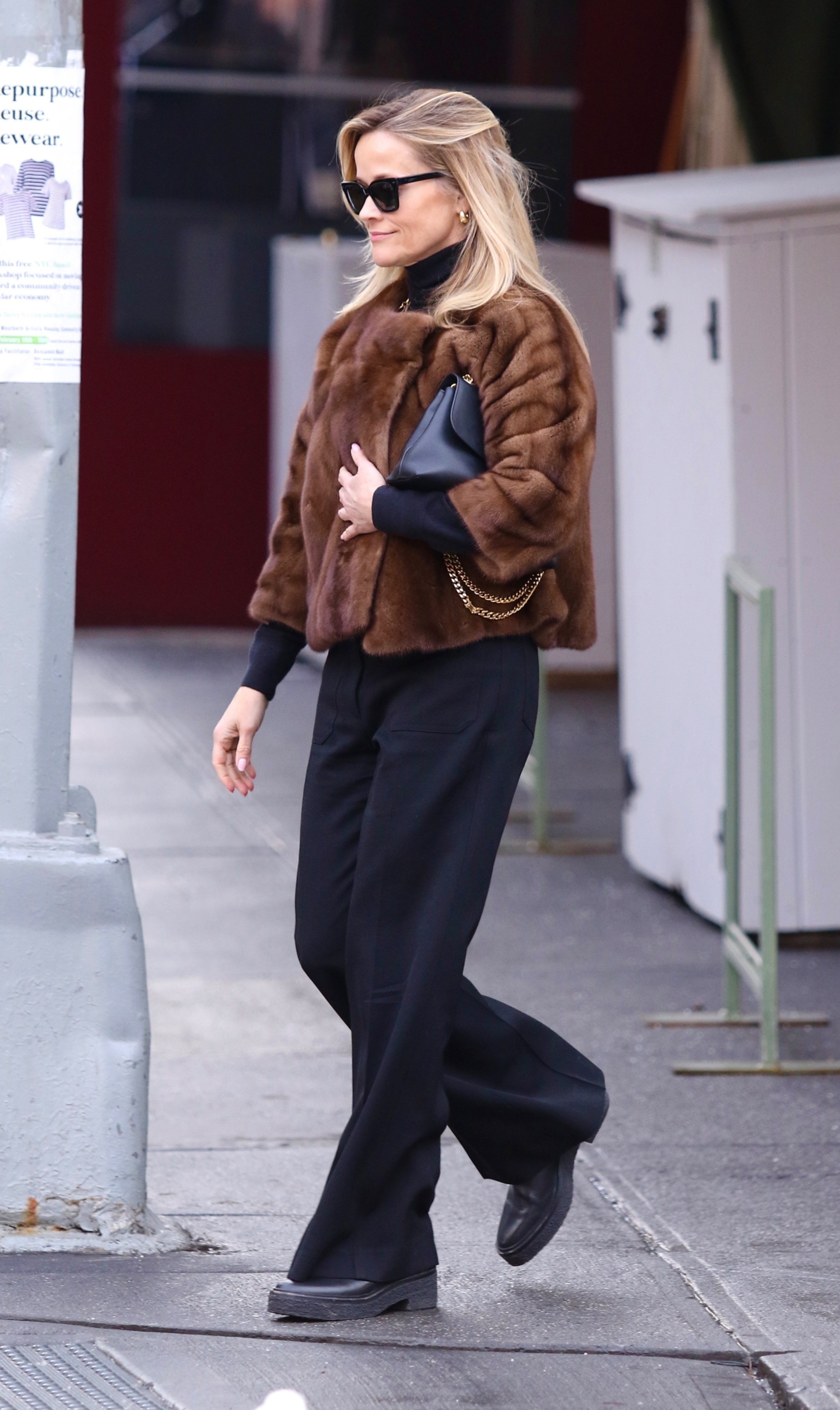 Reese Witherspoon Styles a Luxe Fur Coat With Chunky Black Boots and a Classic Bag