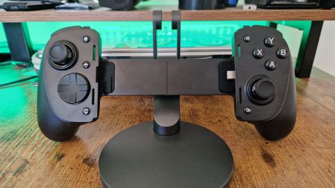 Razer Kishi Ultra review image showing the controller leaning against a stand