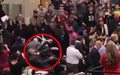 An altercation between a photographer and Secret Service at a Trump rally.