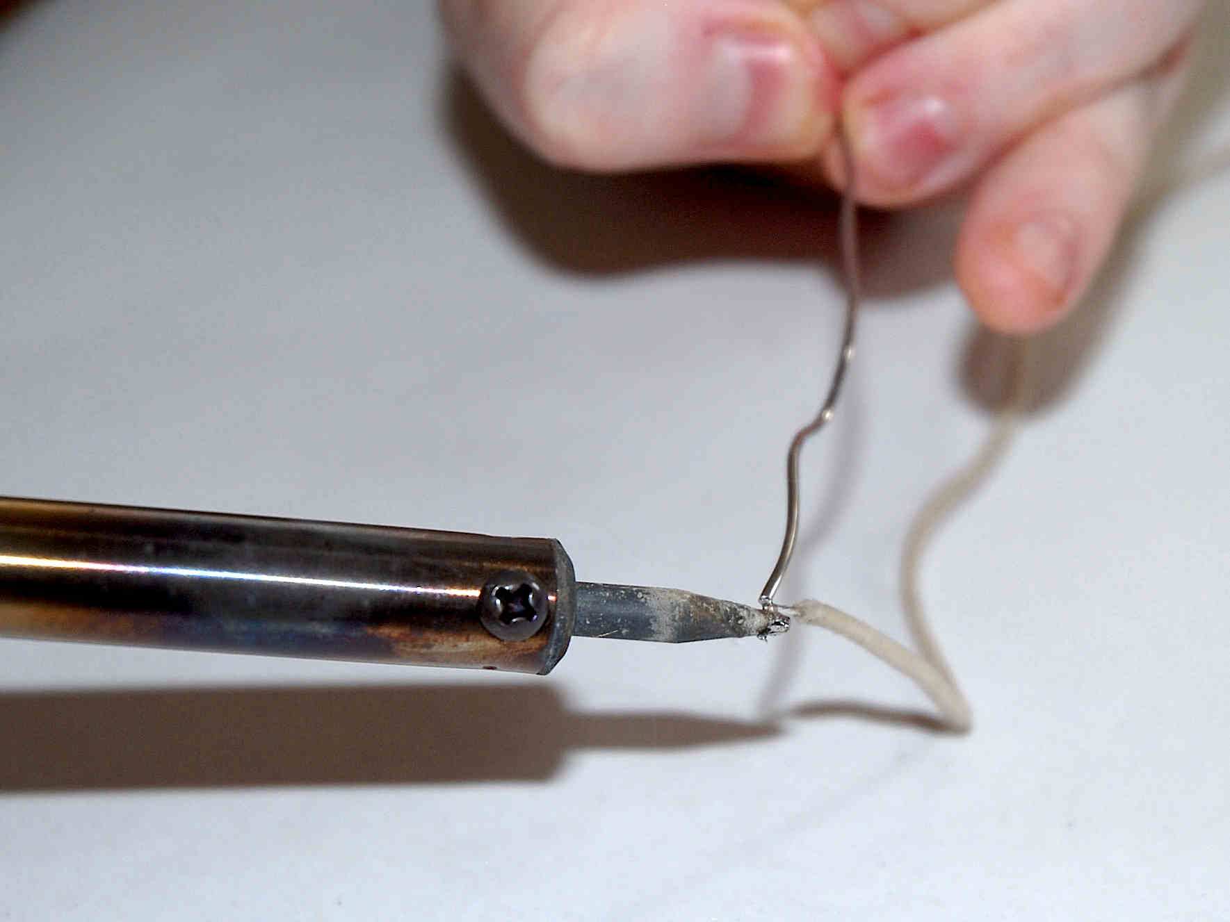 Coil-splitting a humbucking pickup applying the solder