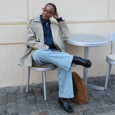 @taffymsipa wears jeans, black boots, trench coat