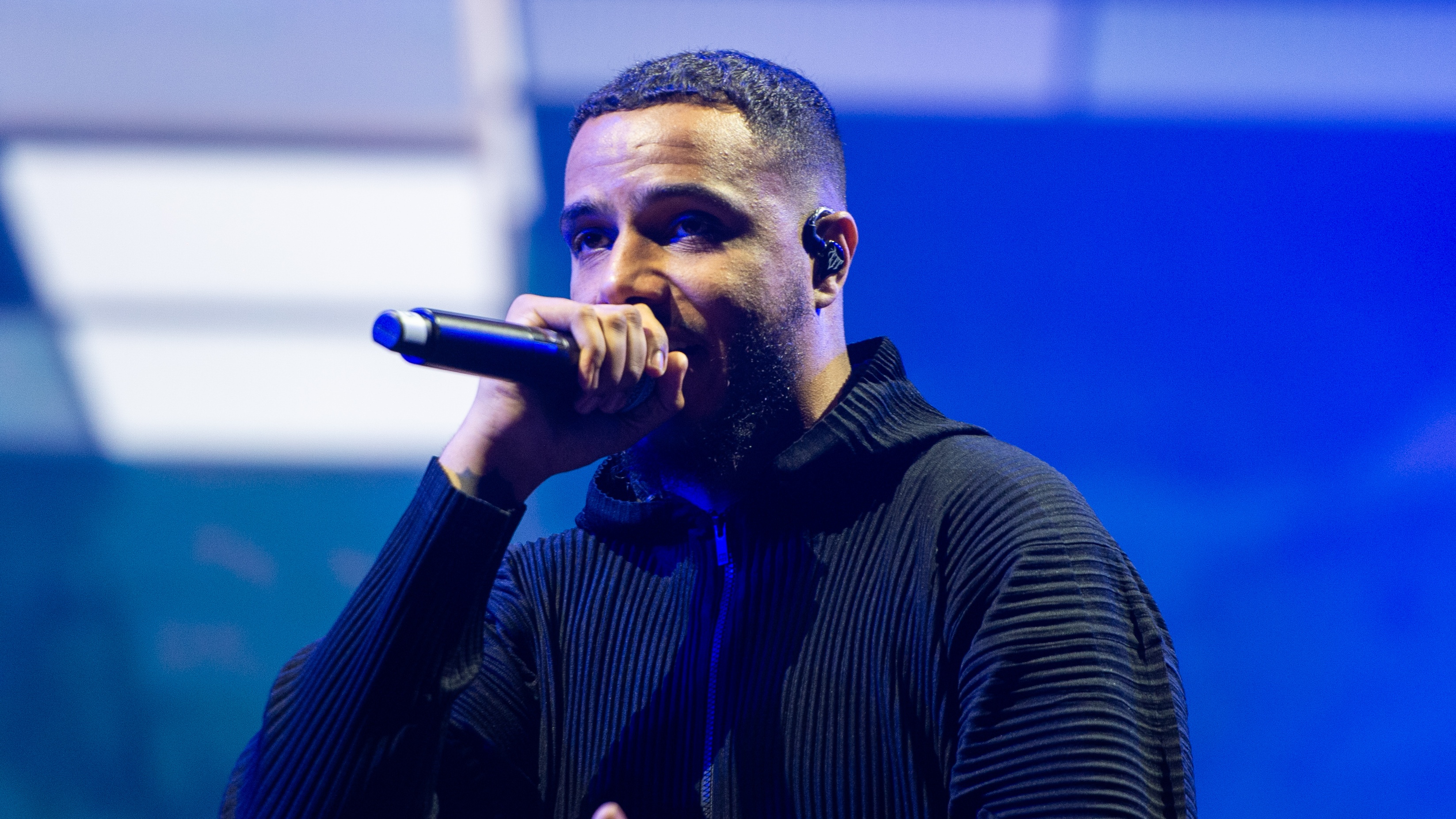 AJ Tracey performing