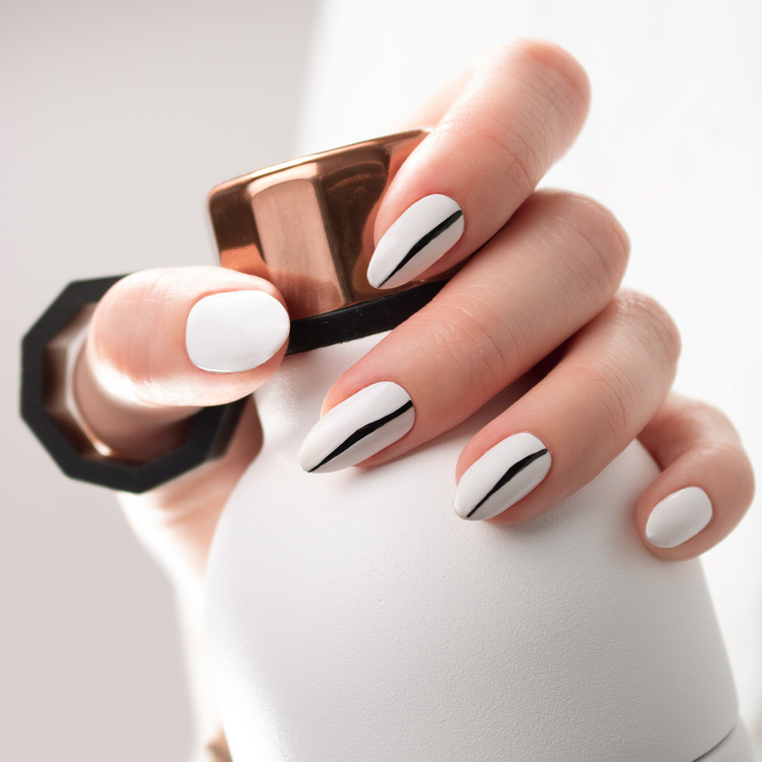 white nails with black lines