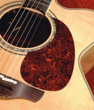 Takamine has gone for the sexy flame maple look.