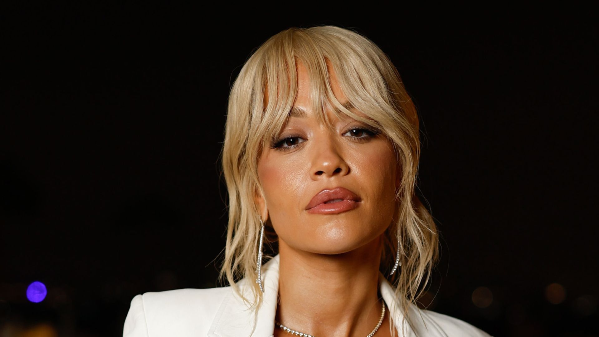 Rita Ora curtain bangs, '90s inspired