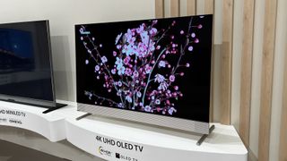 Toshiba OLED TV with silver design at a trade show