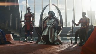 Angela Bassett's Queen Regent Ramonda sits on the Wakandan Throne in Black Panther 2