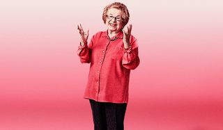 Ask Dr. Ruth the doctor stands in front of a pink background