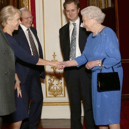 Queen Elizabeth meeting Helen Mirren at a reception
