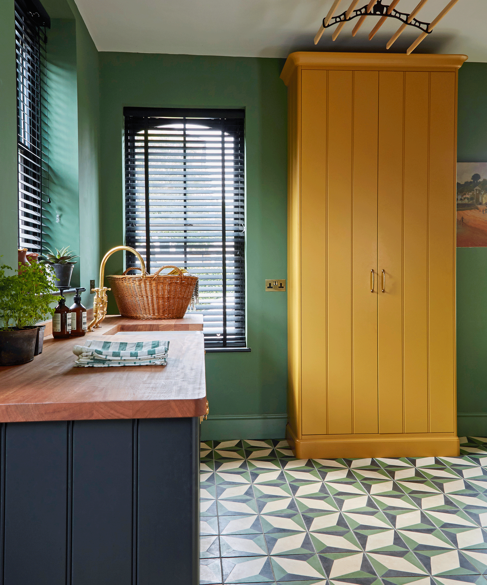 Colorful kitchen with yellow freestanding cabinet
