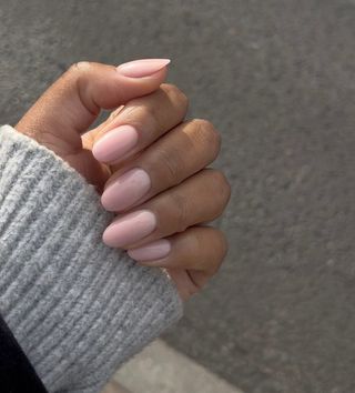 @paintedbyjools almond-shaped baby pink nails