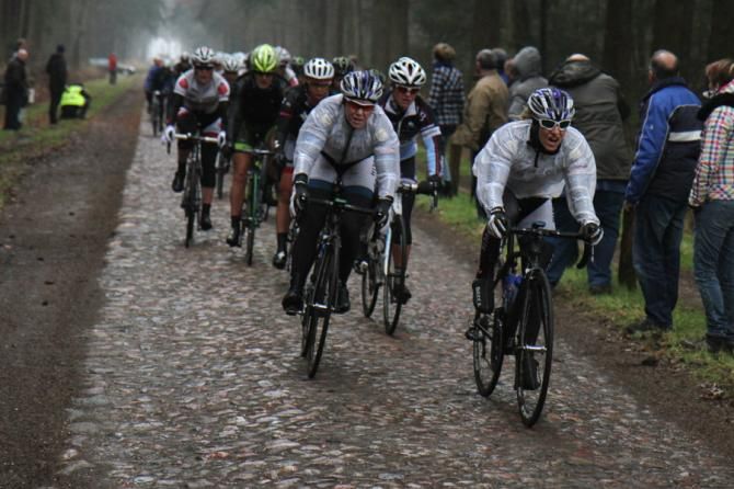 Hitec eading the peloton on the cobbles.