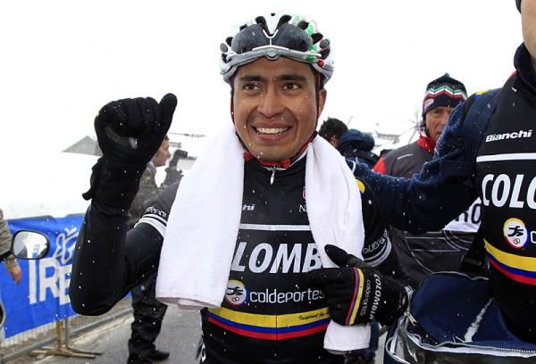 On top of the snow-laden Passo Pordoi, Darwin Atapuma is all smiles after winning the Giro de Trentino's final stage.