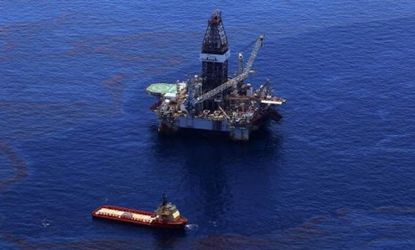 Crews work in May 2010 to stop the flow of oil in the Gulf of Mexico: Some BP managers may reportedly be charged with manslaughter over the disaster, which killed 11 workers.
