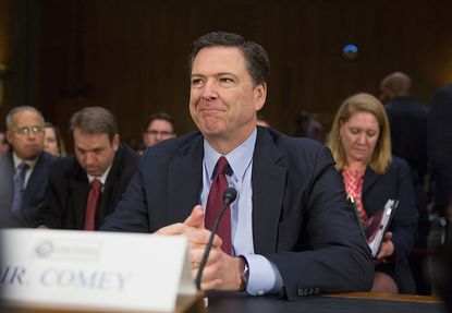 James Comey won't confirm or deny reports that the FBI is investigating Donald Trump