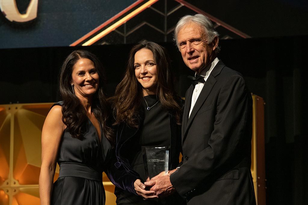 (From l.): Co-host Tracy Wolfson of CBS Sports; AMC Networks CEO Kristin Dolan, accepting the Iconic Show award on behalf of &lsquo;The Walking Dead;&rsquo; and B+C Hall of Fame chairman Bill McGorry.