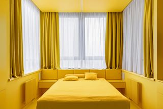 A bright yellow bedroom