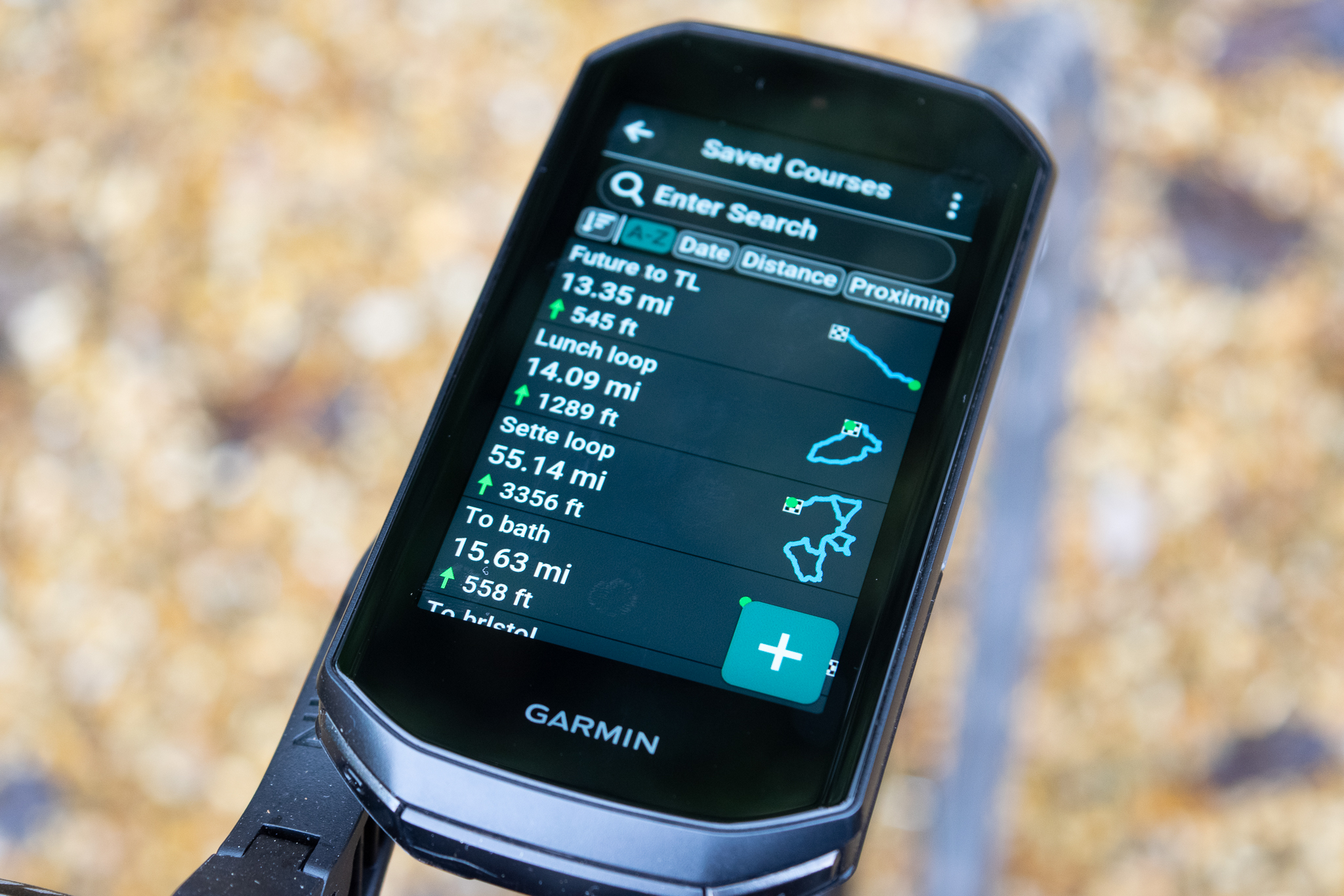 An image of Garmin Edge 1050 on a handlebar mount 