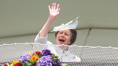 Princess Anne waving to the crowds at Epsom Derby
