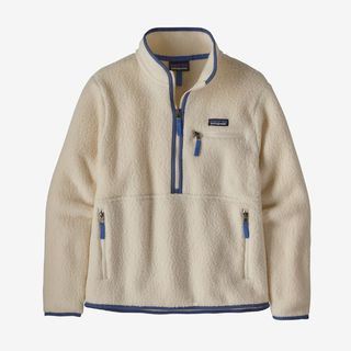 A cream cut out of a Patagonia fleece shot against a light grey background