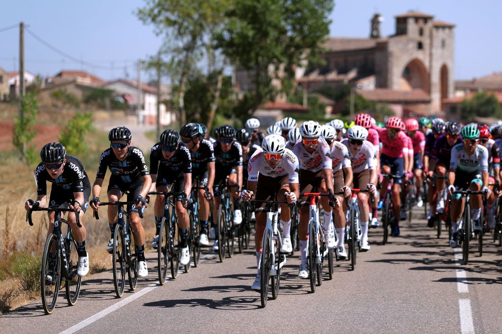 BURGOS SPAIN AUGUST 15 LR Michael Storer of Australia Chris Hamilton of Australia and Team DSM Lilian Calmejane of France and Mickal Cherel of France and AG2R Citren Team lead The Peloton during the 76th Tour of Spain 2021 Stage 2 a 1667km stage from Caleruega Monasterio de Santo Domingo de Guzmn to Burgos Gamonal lavuelta LaVuelta21 CapitalMundialdelCiclismo on August 15 2021 in Burgos Spain Photo by Gonzalo Arroyo MorenoGetty Images
