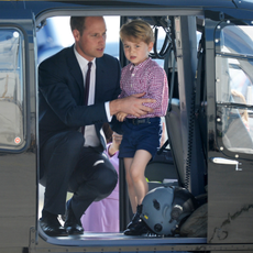 Prince George of Cambridge, Prince William, Duke of Cambridge look in a helicopter as they depart from Hamburg airport on the last day of their official visit to Poland and Germany on July 21, 2017 in Hamburg, Germany.