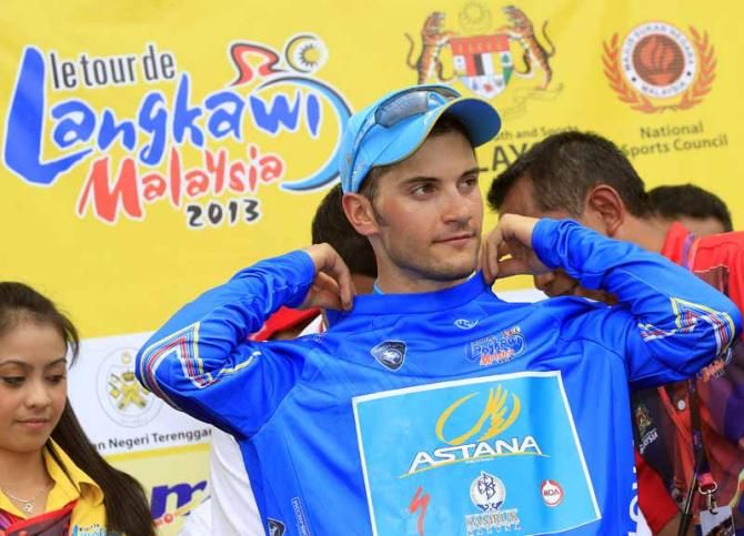 Andrea Guardini (Astana) pulls on the points jersey