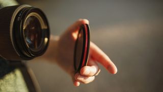 The Moment CineBloom VND being placed on a camera lens