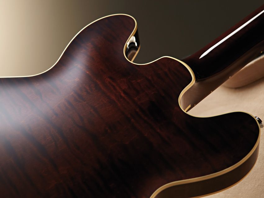 Note how the binding is tastefully sculpted around the heel.