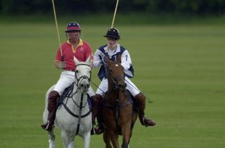 Prince Harry and Prince Charles playing polo