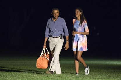 Obama is back in Washington from vacation to address Iraq, Ferguson