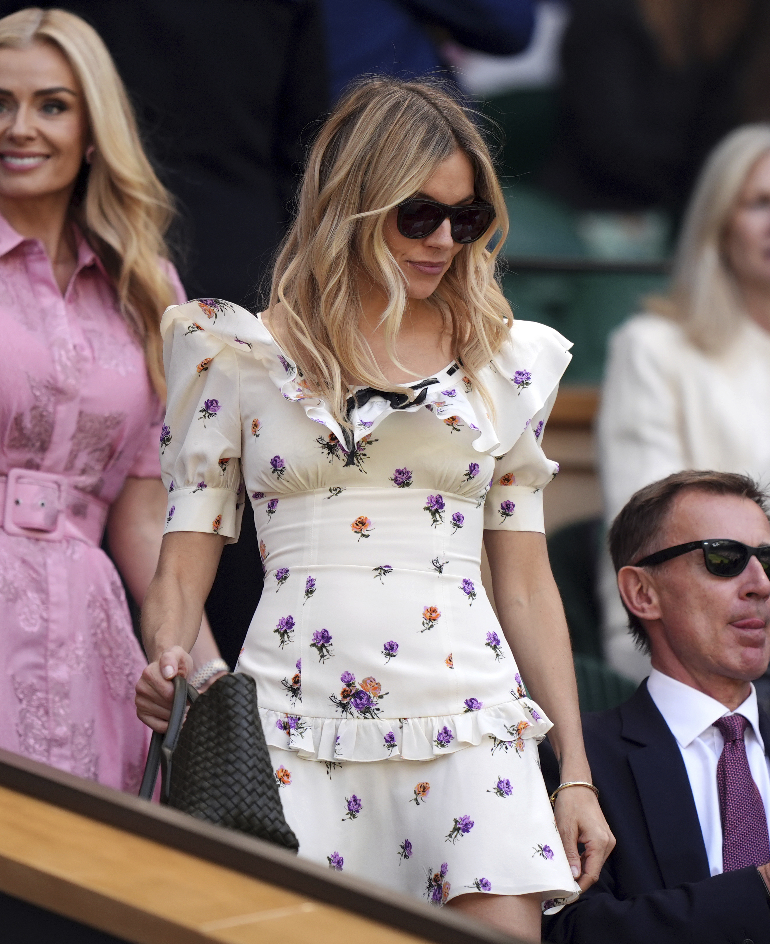 Sienna Miller attended Wimbledon 2025 in a floral little white dress from Alessandra Rich
