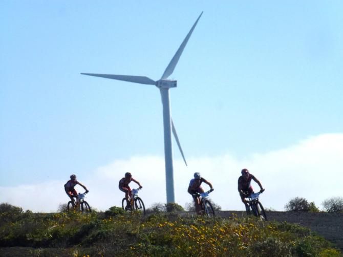 The leaders pass a windmill en route