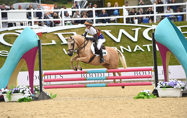 Laura Renwick and Scarlett Lomax-Cox, winners of the invitational Mini Major Relay during the Equerry Bolesworth International Horse Show at Bolesworth Castle near Chester in Cheshire in the UK on 17th June 2018