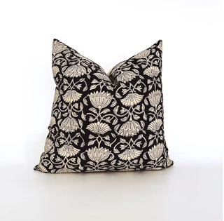 A black and white floral pillow cover