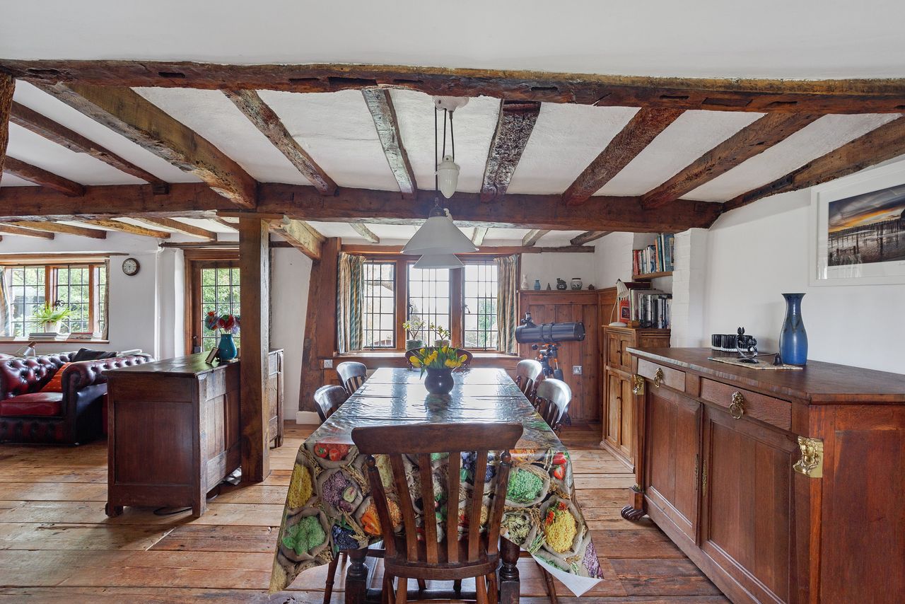Images of a very wonky house called The Cottage