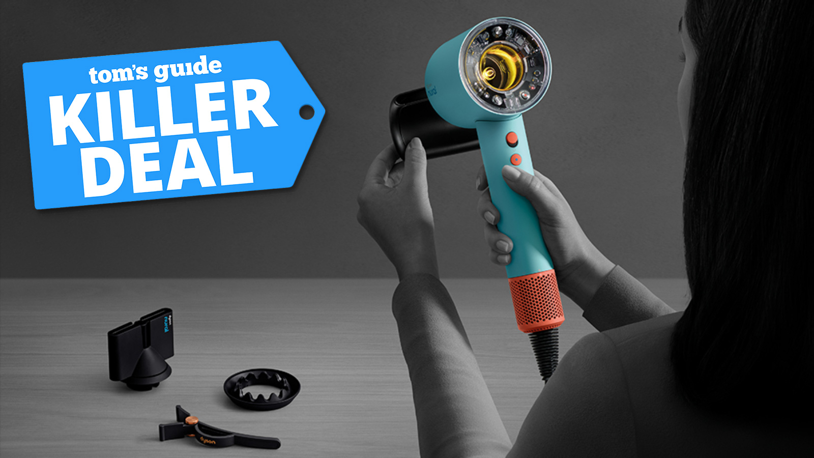 Promotional image with woman holding the Dyson Supersonic Nural in the Ceramic Patina / Topaz colour option