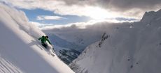 ER3CDC Man Powder Skiing at sunset, Lech, Austria