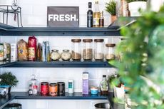 Pantry storage shelves with glass food jars
