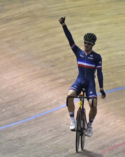 Thomas Boudat celebrates winning the elimination race in the men's omnium