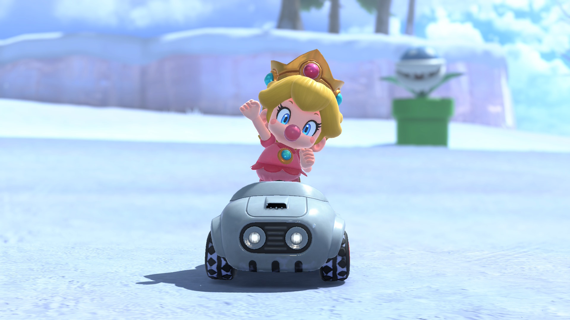Baby Peach driving in the Baby Boomer kart in Mario Kart World