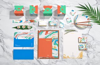 Brightly-coloured marbling forms a key part of Toko's menu design