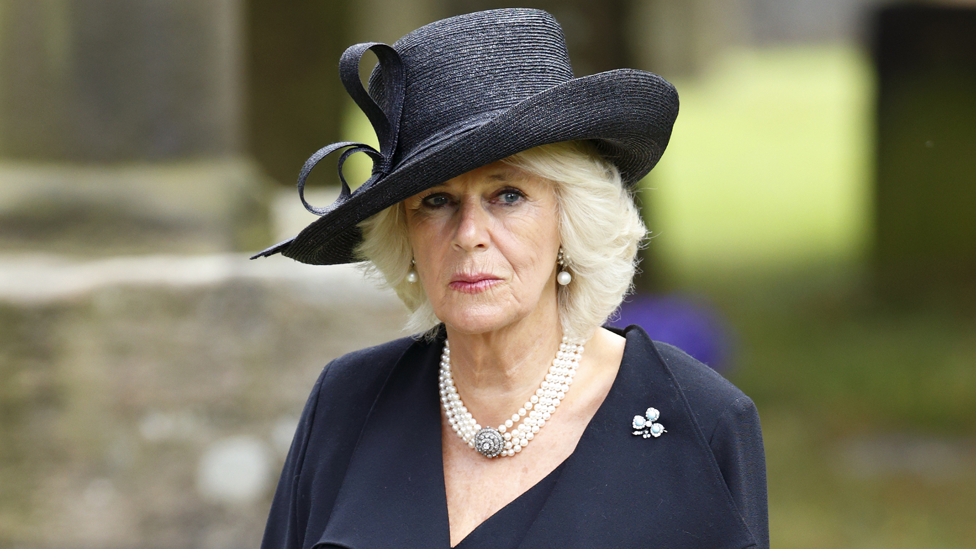 CHATSWORTH, UNITED KINGDOM - OCTOBER 02: (EMBARGOED FOR PUBLICATION IN UK NEWSPAPERS UNTIL 48 HOURS AFTER CREATE DATE AND TIME) Camilla, Duchess of Cornwall attends the funeral of Deborah, Dowager Duchess of Devonshire at St Peter&#039;s Church, Edensor on October 2, 2014 in Chatsworth, England. Deborah Cavendish, Dowager Duchess Of Devonshire, the last surviving Mitford sister, died aged 94 on September 24, 2014. Deborah was known as the &#039;housewife duchess&#039;, and her noted business acumen made Chatsworth House one of the most successful and profitable stately homes in England. (Photo by Max Mumby/Indigo/Getty Images)